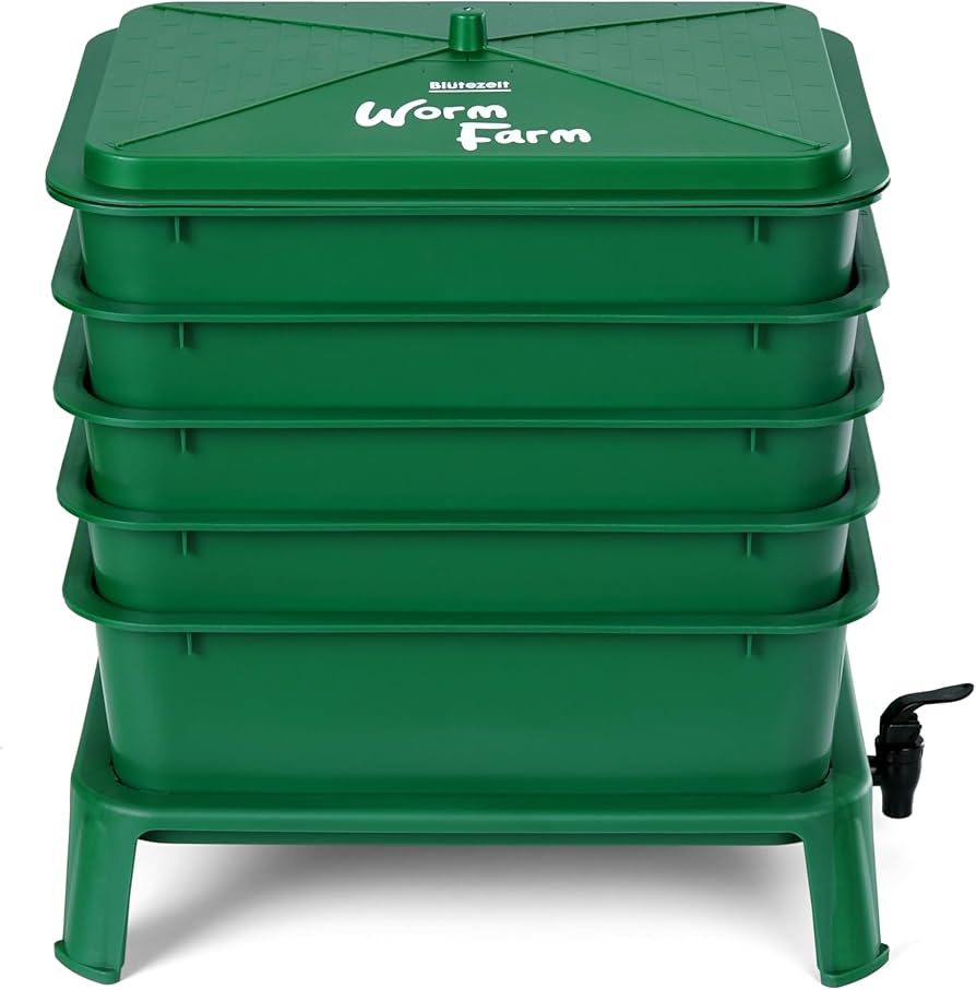 A green work bin tower with a spigot on the bottom.